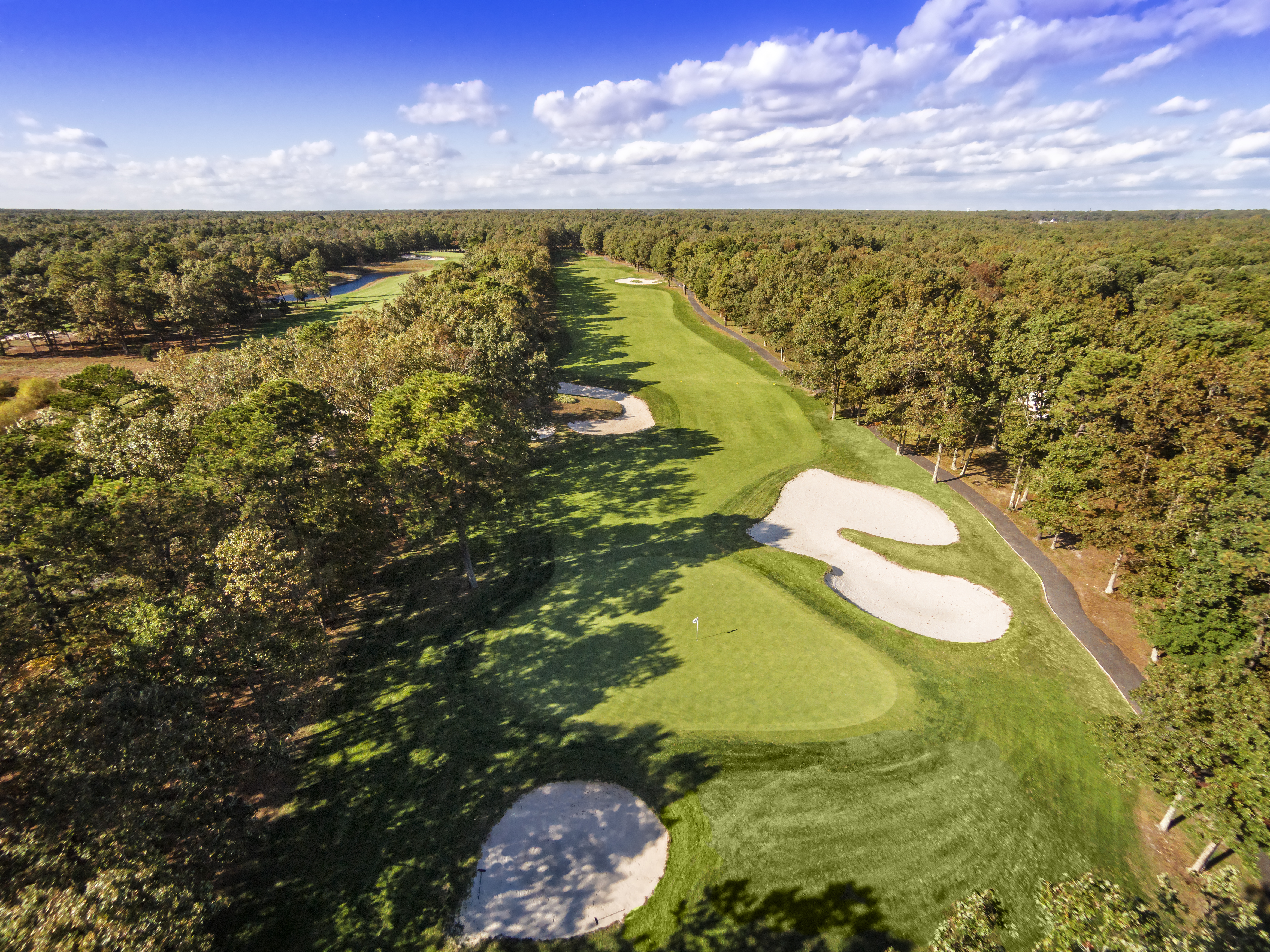 Aerial view of golf course with bunkers