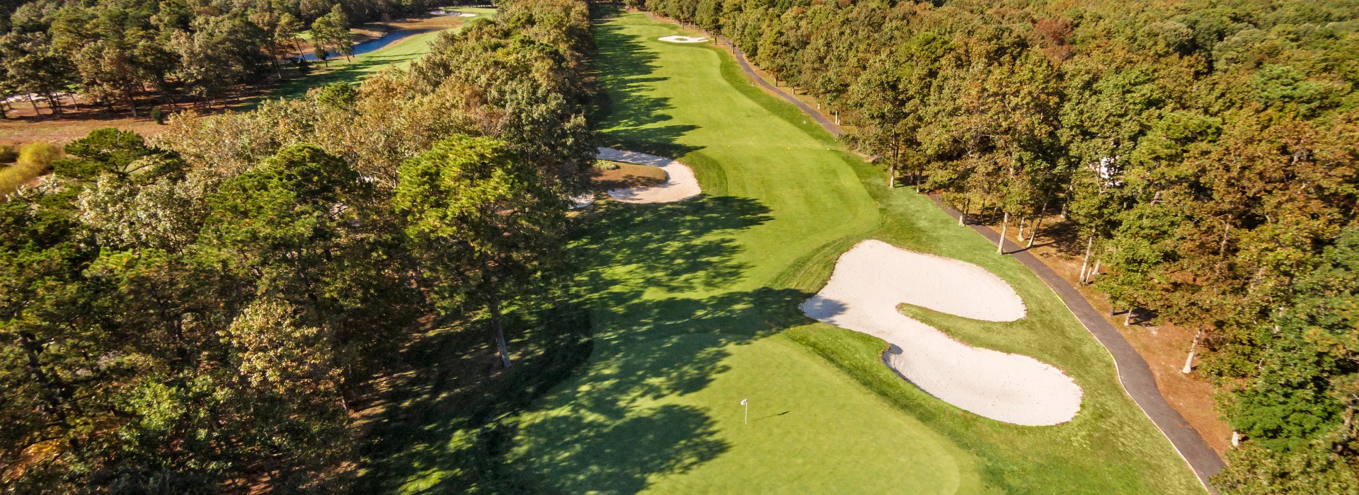 Aerial view of golf course with bunkers